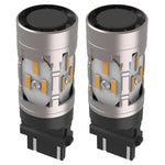 Two car light bulbs on a white background