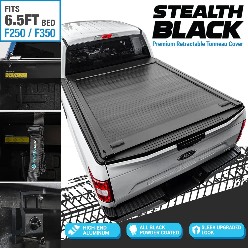 stealth black premium edition retractable tonneau cover installed on white F-150 6.5ft standard bed