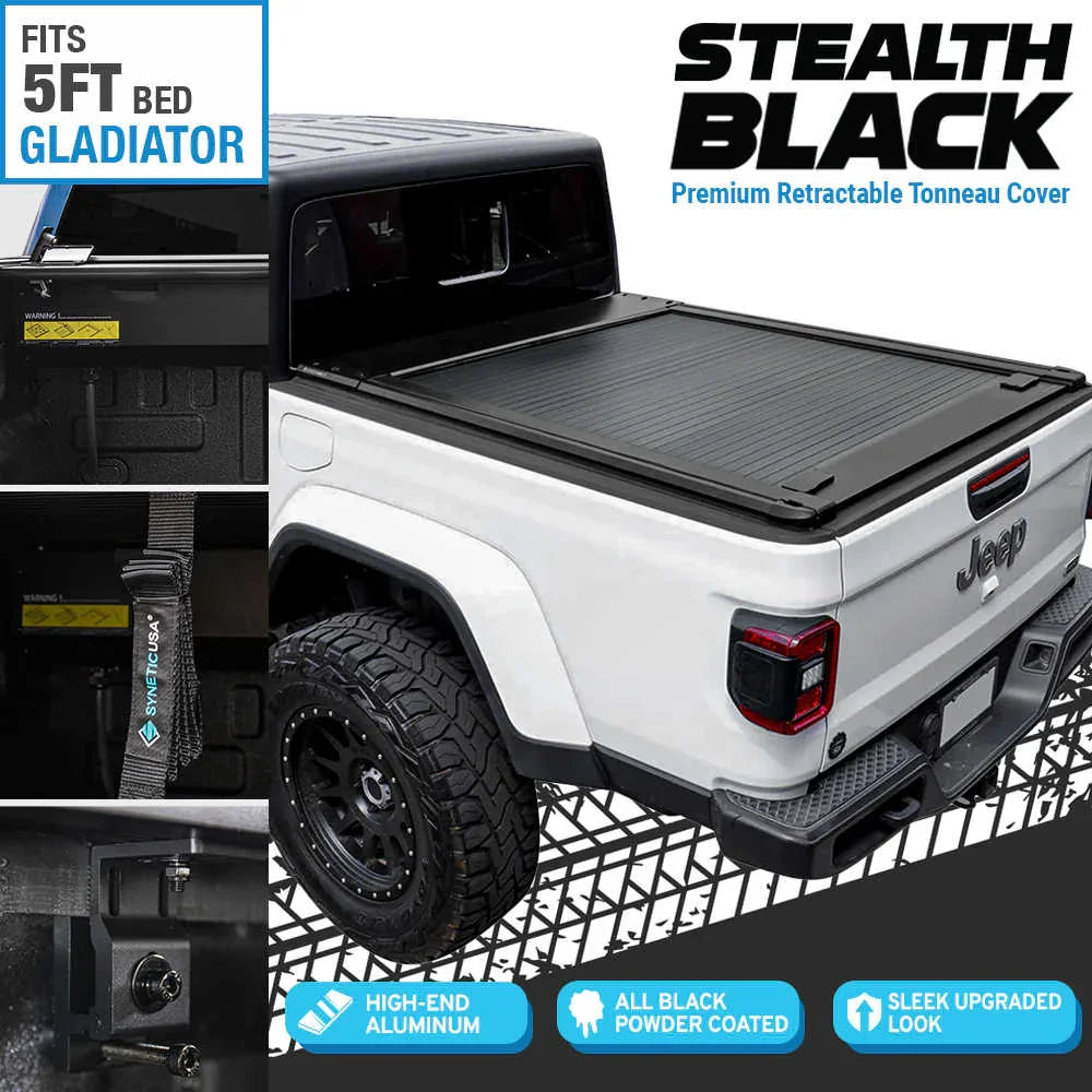 Stealth Black premium retractable tonneau cover on a white Jeep Gladiator truck bed.