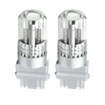 Two red LED light bulbs with an aluminum body designed for vehicle braking systems