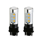 Two Type 1 switchback LED light bulbs with red and amber colors, designed for use in front turn signal, DRL, or parking light applications.