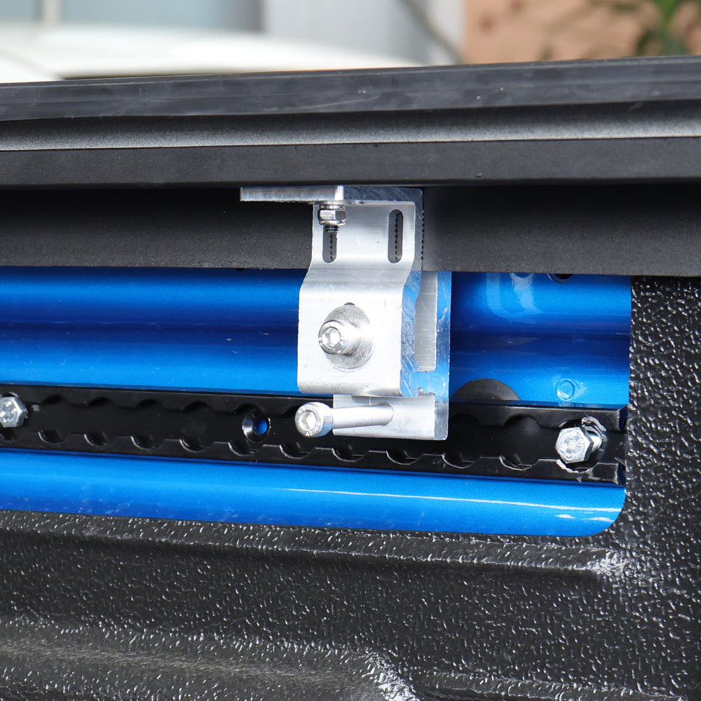 silver L-clamps made of stainless steel, designed for tonneau cover replacements, displayed on Mavericks truck bed