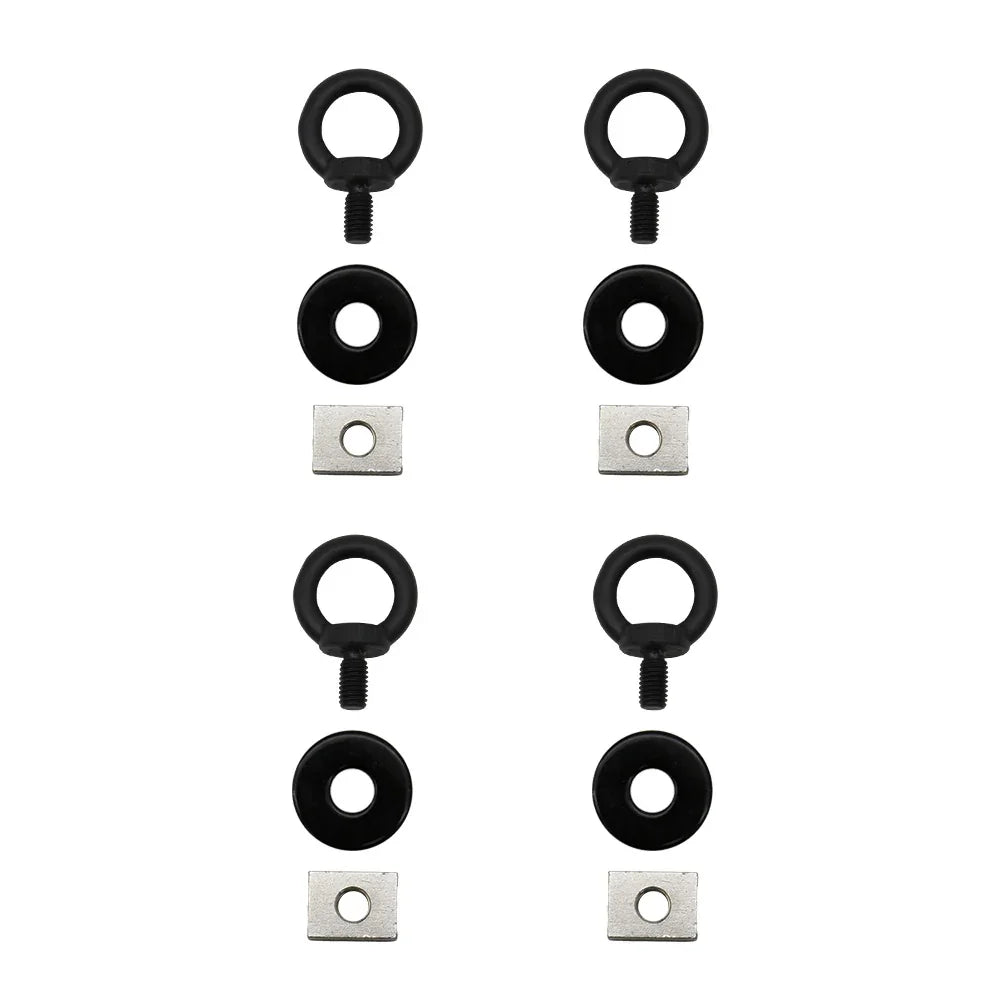 Set of black eyelets and metal washers on a white background