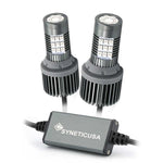 Two red LED brake light bulbs with heat sinks and an electronic control unit, branded Syneticusa.