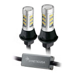 Two LED bulbs with a white and amber color, designed for front turn signal lighting, with a built-in resistor, branded Syneticusa.
