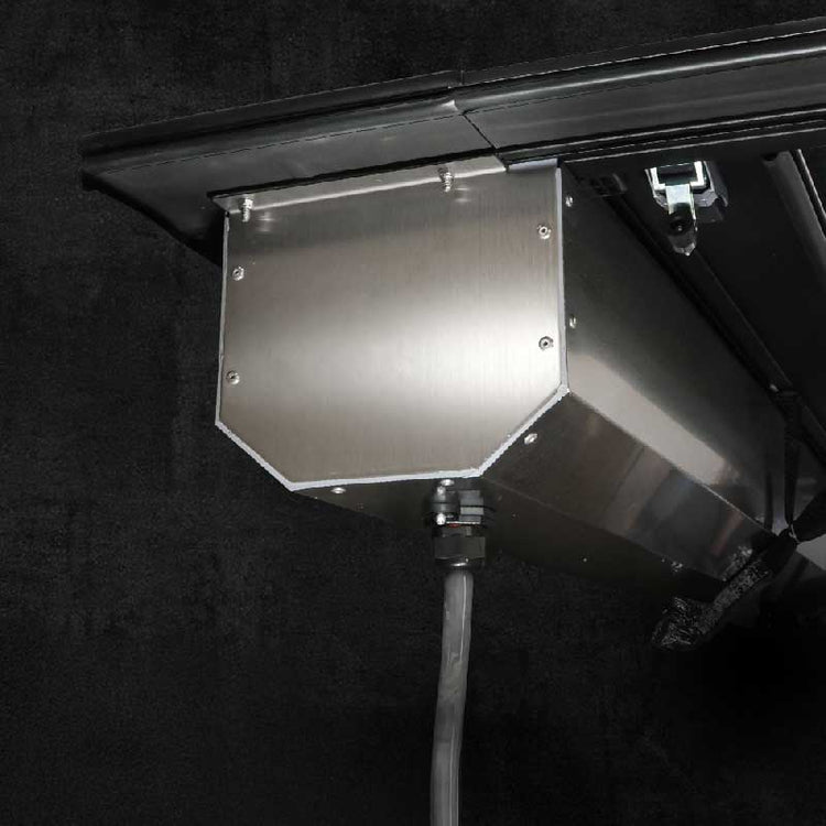 stainless steel canister on a dark background