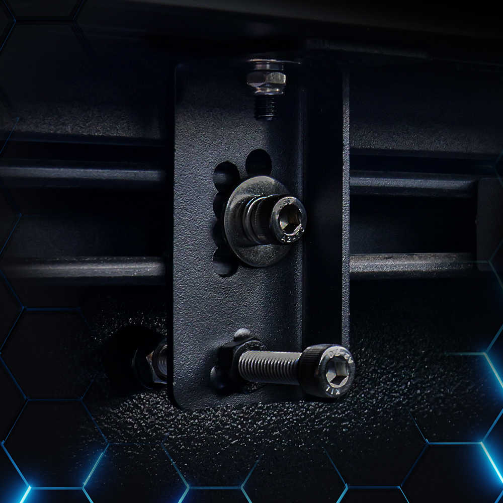 Close-up of a powder coat clamp with bolts on a dark background