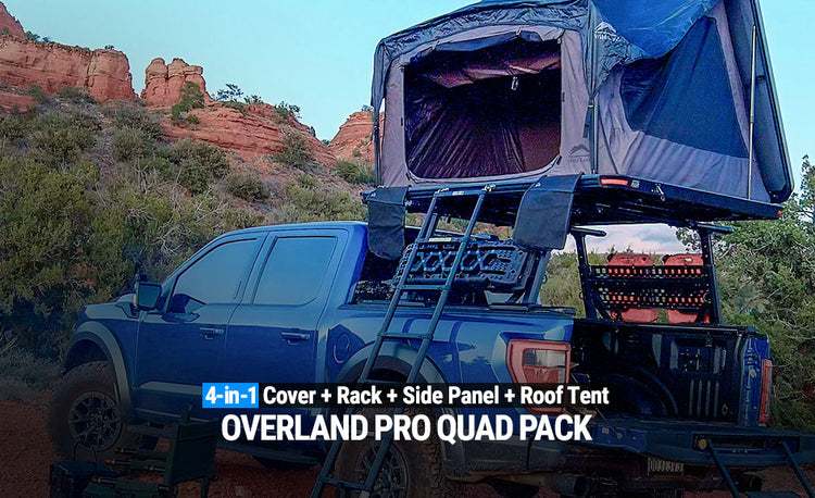 Blue truck with Overland Pro Quad Pack setup in a desert landscape