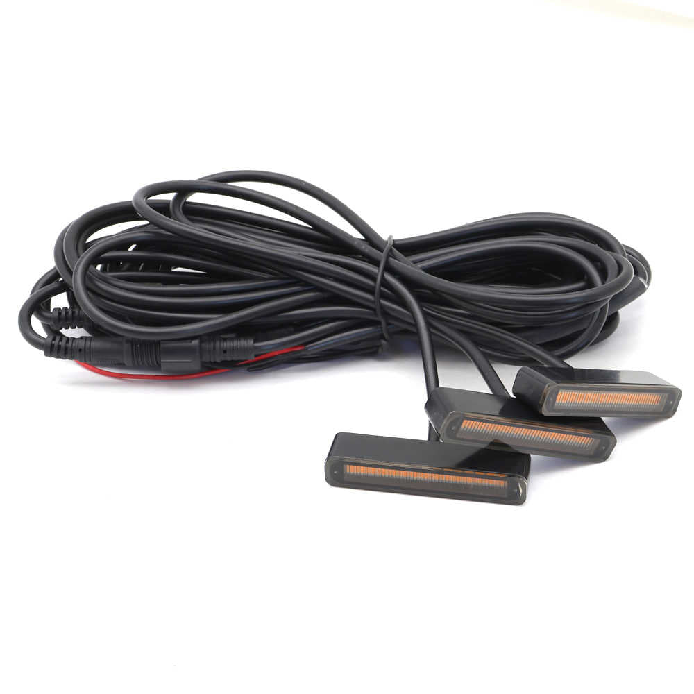 Set of car LED 3 pods grille lights with wiring on a white background