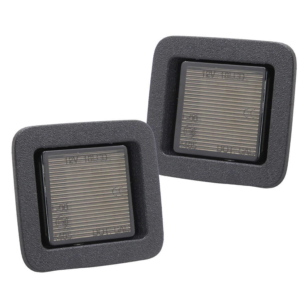 Two square license plate light with metallic grating inside on a white background