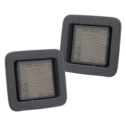 Two square license plate light with metallic grating inside on a white background