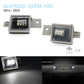 Two silver LED license plate light units for a 2014-2023 Silverado/Sierra 1500, shown on a white background with one illuminated view in the bottom left and an installed view in the bottom right.