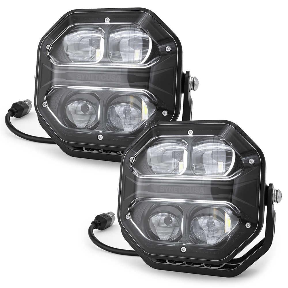 Pair of black off-road headlights on a white background