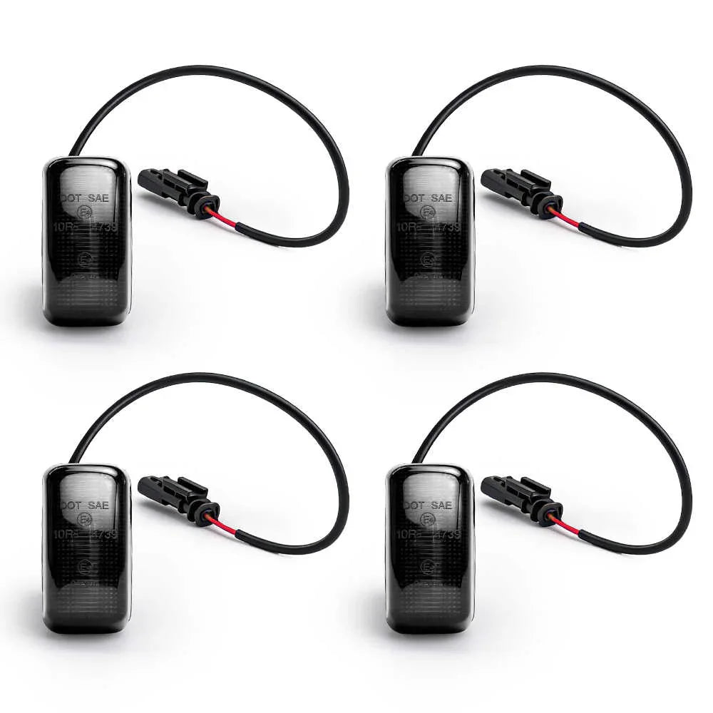Four black fender led light with wires on a white background
