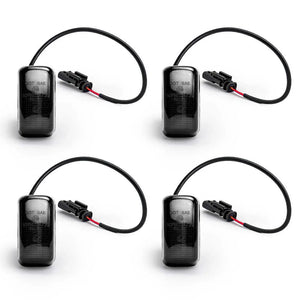 Four black fender led light with wires on a white background