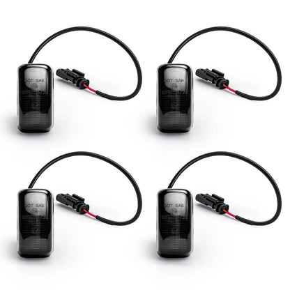 Four black fender led light with wires on a white background