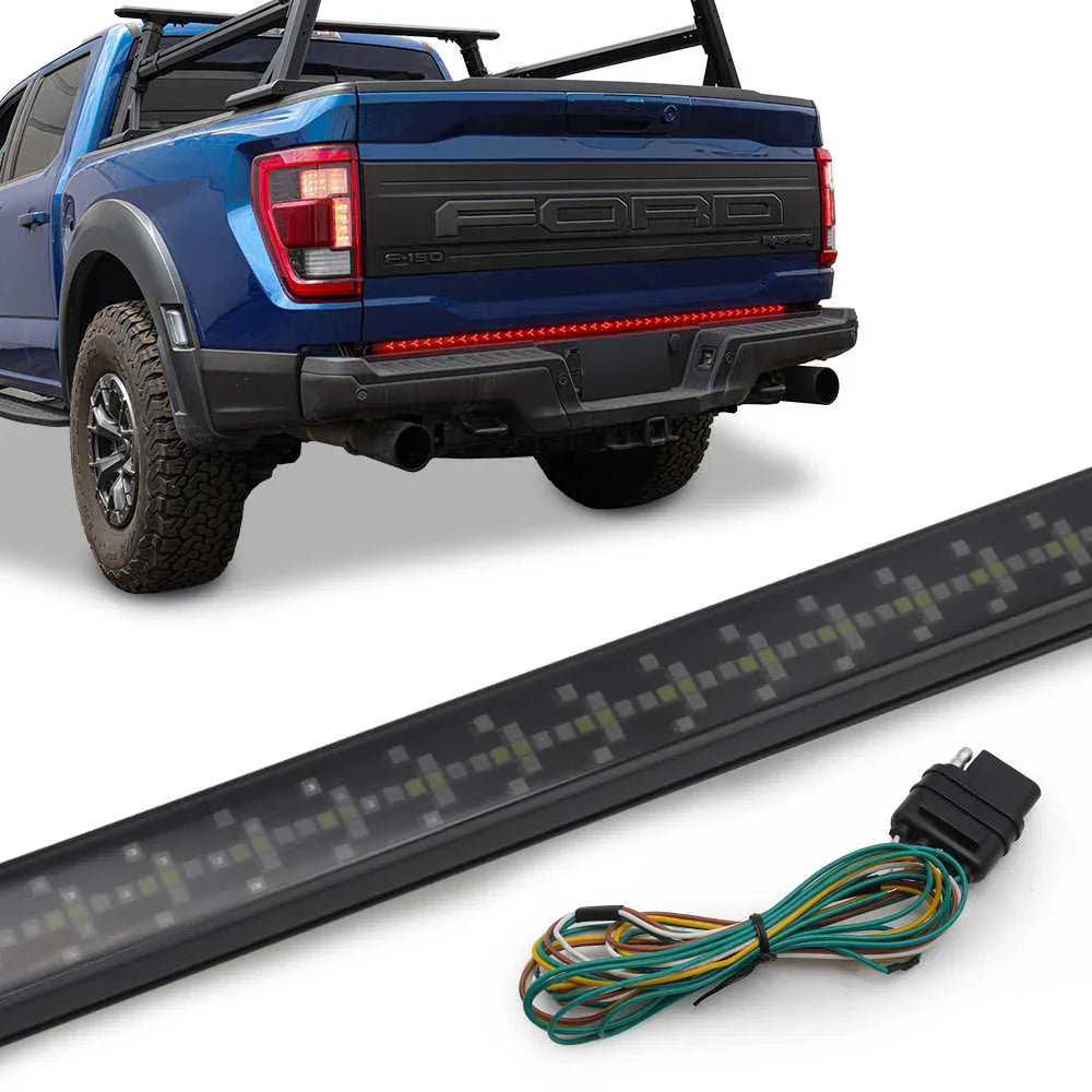 Blue Ford truck with a LED light bar in front on a white background