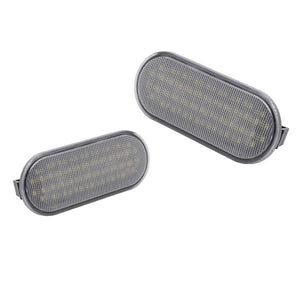 Two oval-shaped LED truck bed light  assembly on a white background