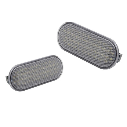 Two oval-shaped LED truck bed light  assembly on a white background
