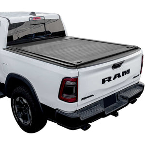 White Ram truck with a black enhanced Enhanced MB tonneau cover on a white background