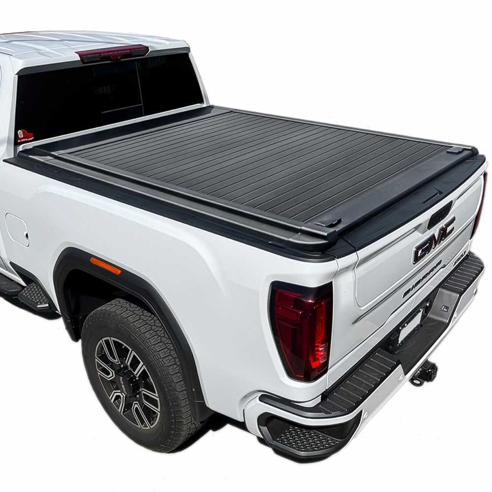White GMC Sierra truck with Enhanced MB tonneau cover on a white background