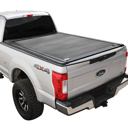 Silver Ford F-250 truck with a syneticusa enhanced MB tonneau cover on a white background