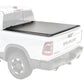 White Ram truck with a tonneau cover on a white background