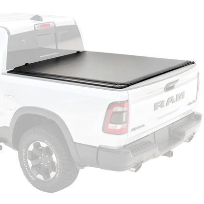 White Ram truck with a tonneau cover on a white background