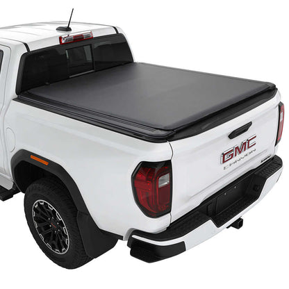 soft roll up tonneau cover installed on white GMC canyon branding SYNETIC USA