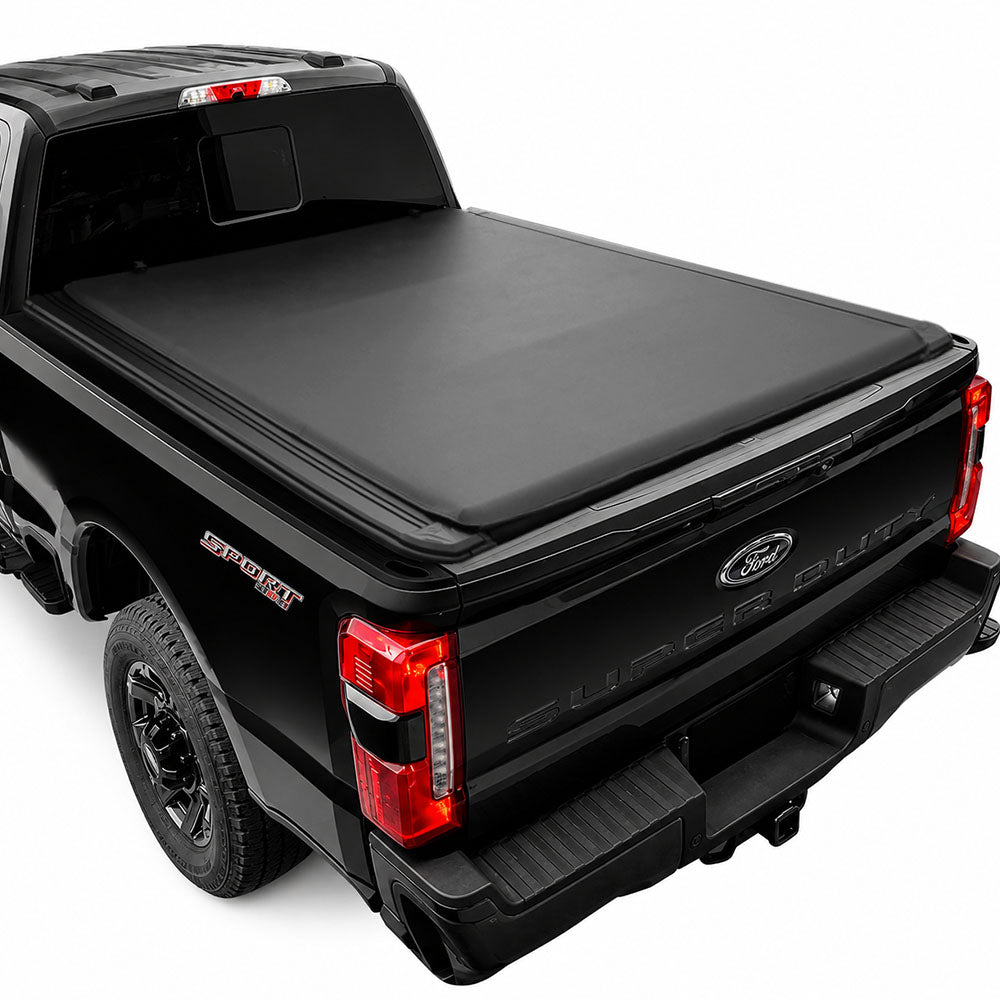 A black soft roll-up tonneau cover installed on the bed of a black Ford F-250 pickup truck, shown from a rear three-quarter angle against a white background.