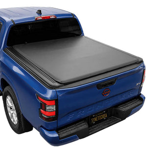 A soft roll up tonneau cover installed over the bed of a blue Frontier truck, shown from a rear three-quarter angle on a white background.