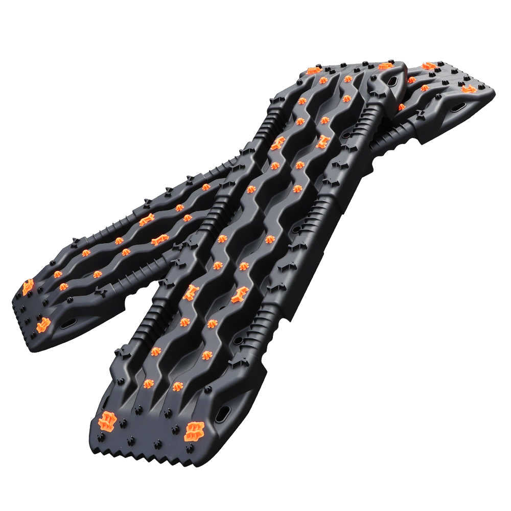 Black and orange snowmobile tracks on a white background