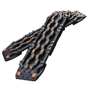 Black and orange snowmobile tracks on a white background