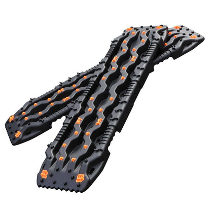 Black and orange snowmobile tracks on a white background