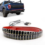 LED strip light with connectors on a white background, with a blue truck in the background.