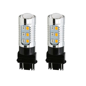 Two Type 1 switchback LED light bulbs with red and amber colors, designed for use in front turn signal, DRL, or parking light applications.