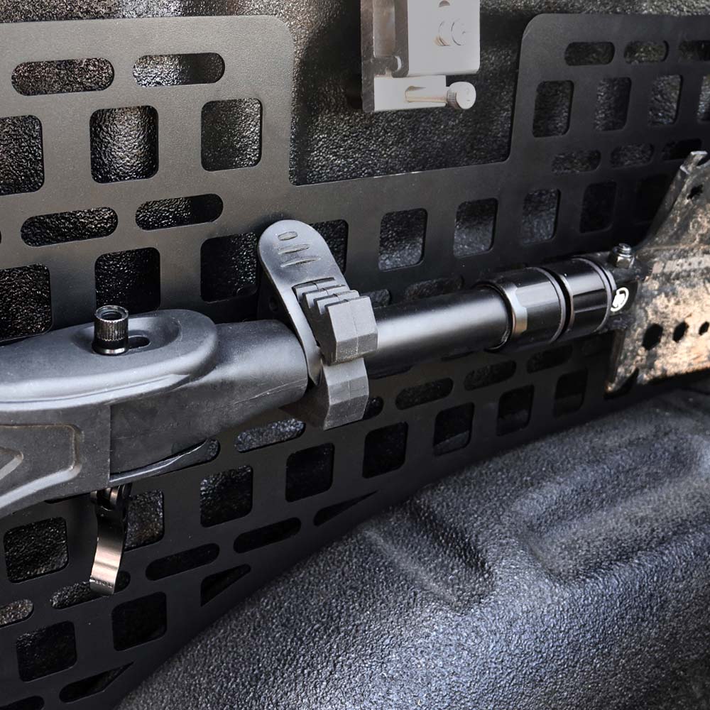 close up of rubber mounting kit installed on molle panel use case