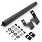 Set of components including a large black roller and various smaller parts on a white background