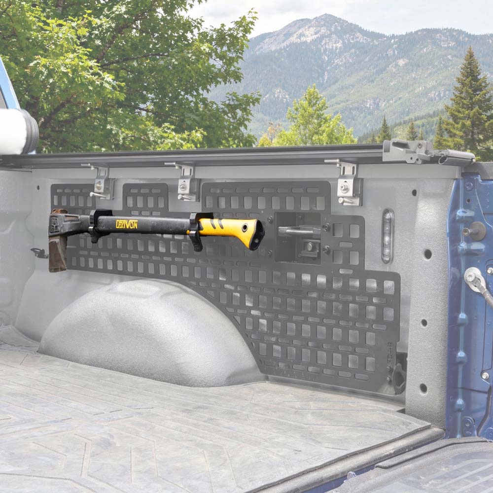bedside molle panel equipped with mounting kit holding an axe