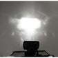 led projector reflecting a bright light on a gray background
