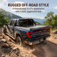 Black truck on a rugged off-road path with mountains in the background
