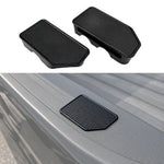 Two black textured plastic truck bed liner guards shown on a white background, with one also pictured installed on the side of a gray pickup truck bed.