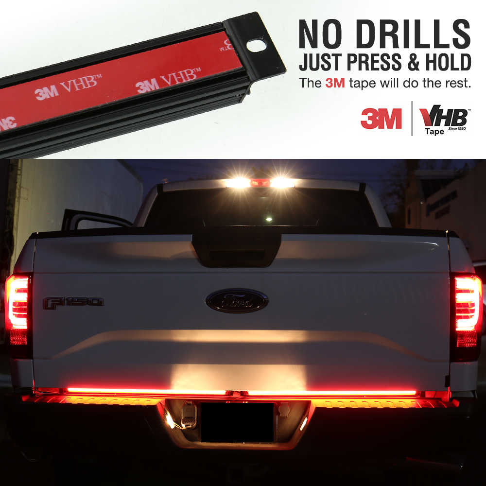 3M VHB tape for vehicle modification with a truck's tail light in the background