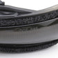 Close-up of a black shoe sole with textured surface and 'DOT SAE' text on a white background