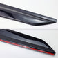 Black car spoiler with red accent on a white background