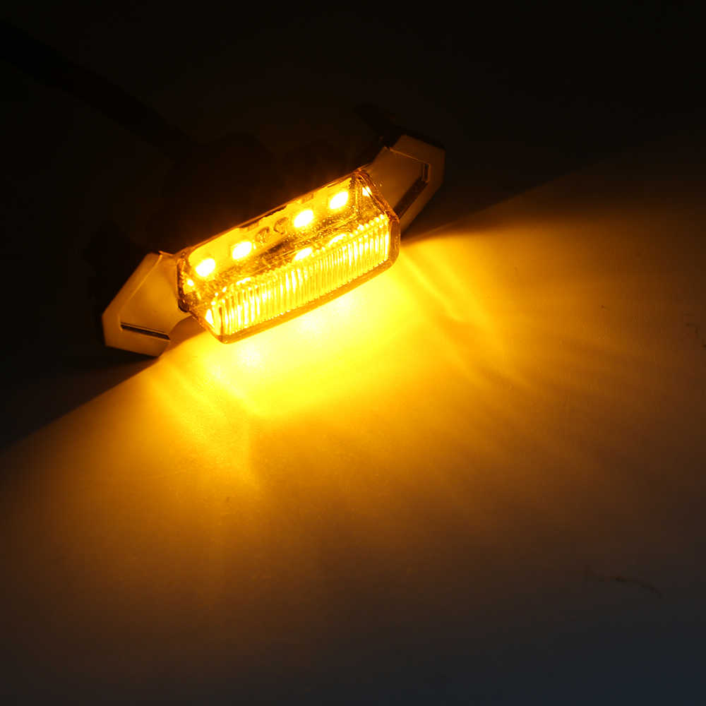 Amber LED light bulb on a dark background
