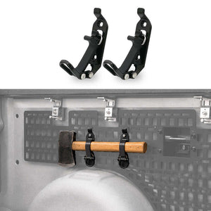 Two black metal axe hooks shown above a faded in-use example of them mounted on a vehicle tailgate, holding a wooden-handled axe.