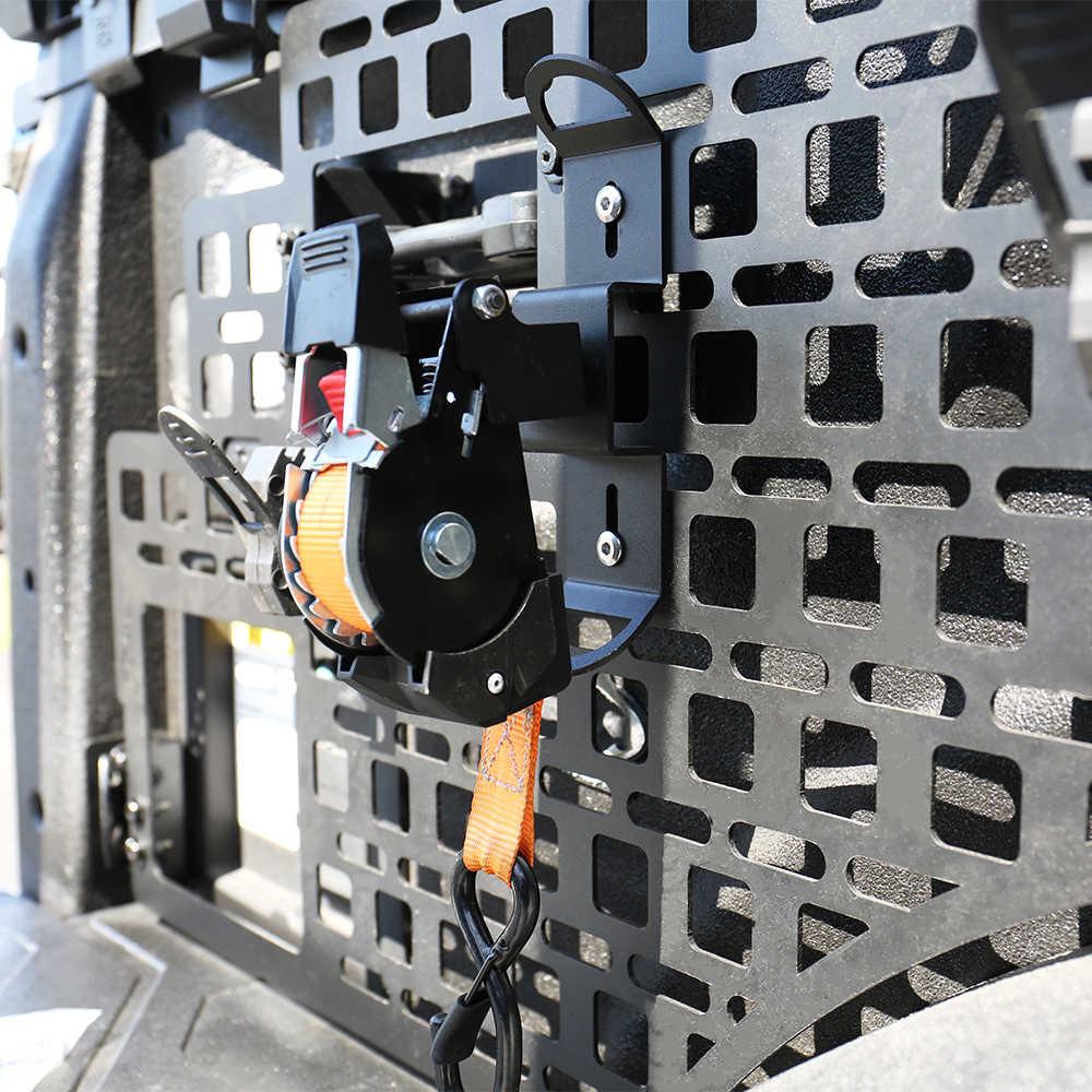 Close-up of a mechanical device attached to a textured metal surface