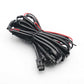 Black electrical wire cable with connectors on a white background
