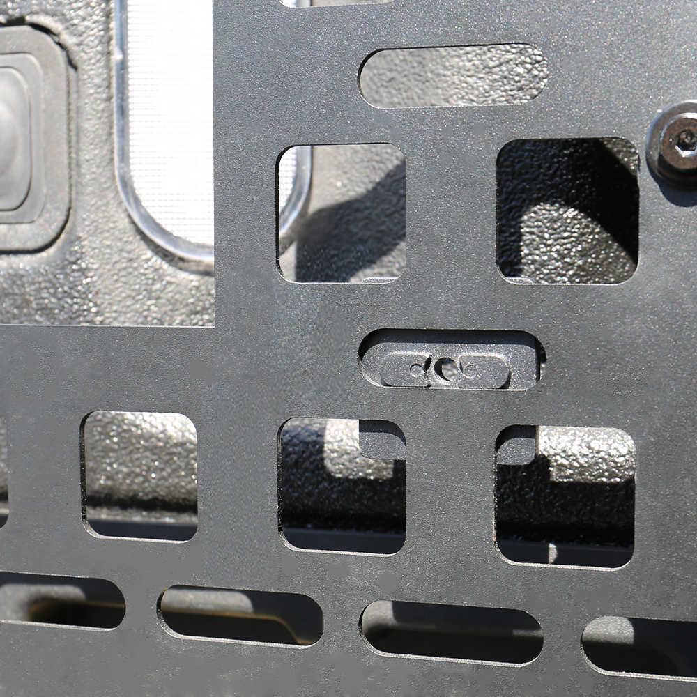 Close-up of a metallic grid with square holes